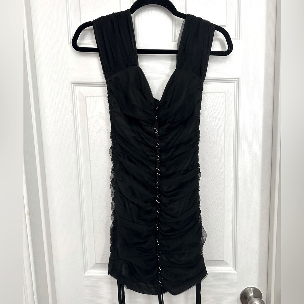 Fashion Nova black sleeveless dress.